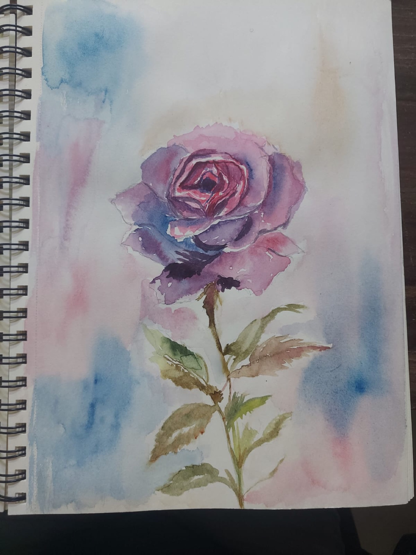Watercolor rose artwork made by a Nino learner